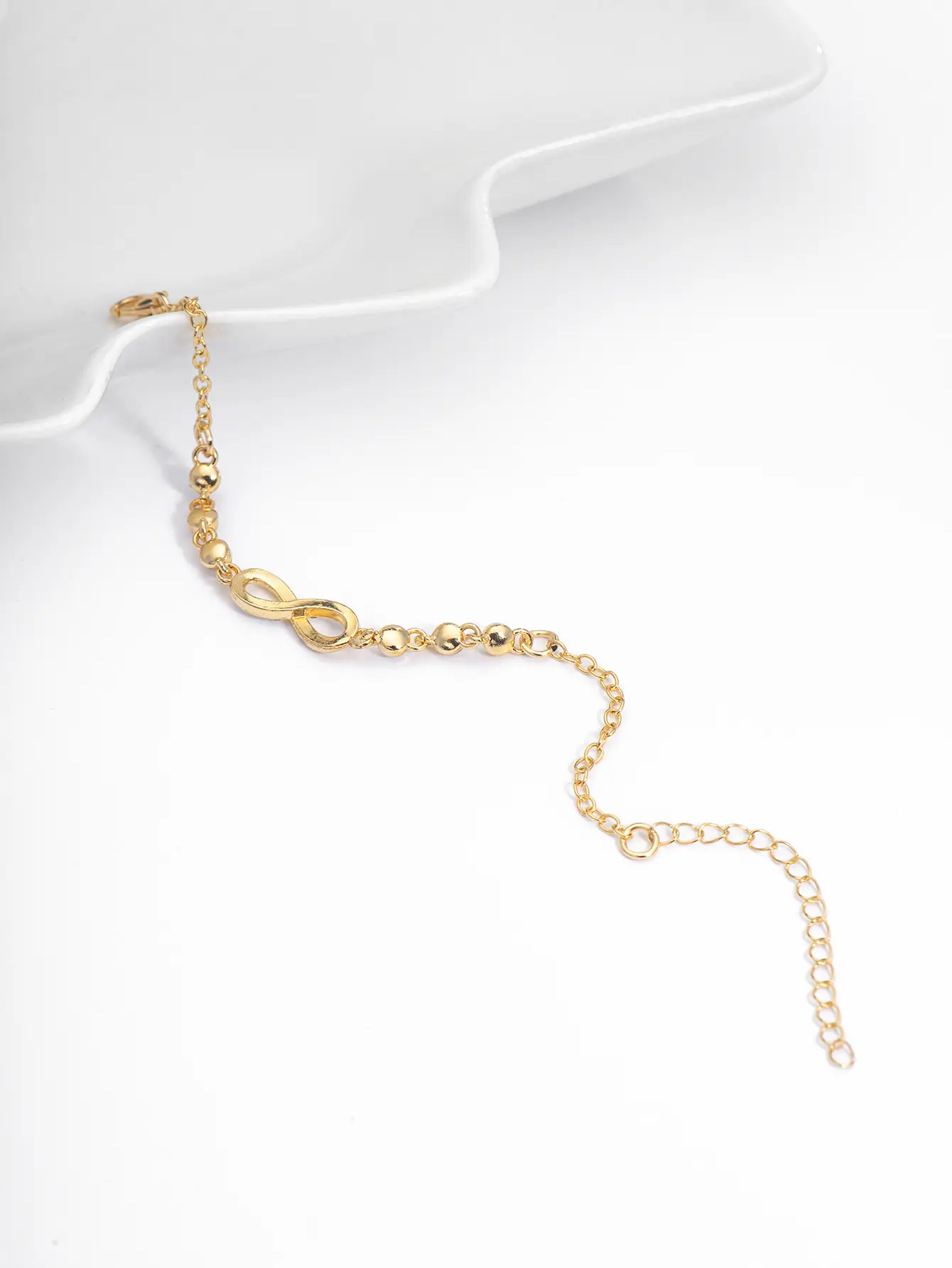 Geometric Infinity Loop 8-Character Charm Bracelet - Image 8