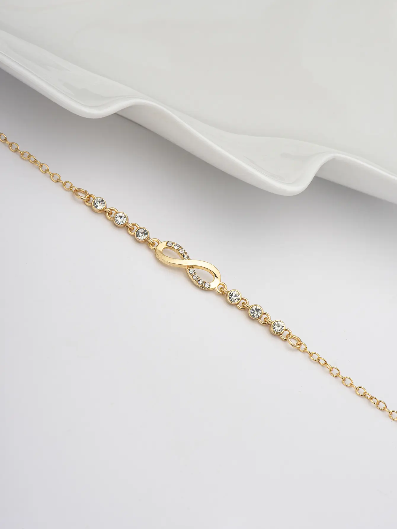 Geometric Infinity Loop 8-Character Charm Bracelet - Image 10